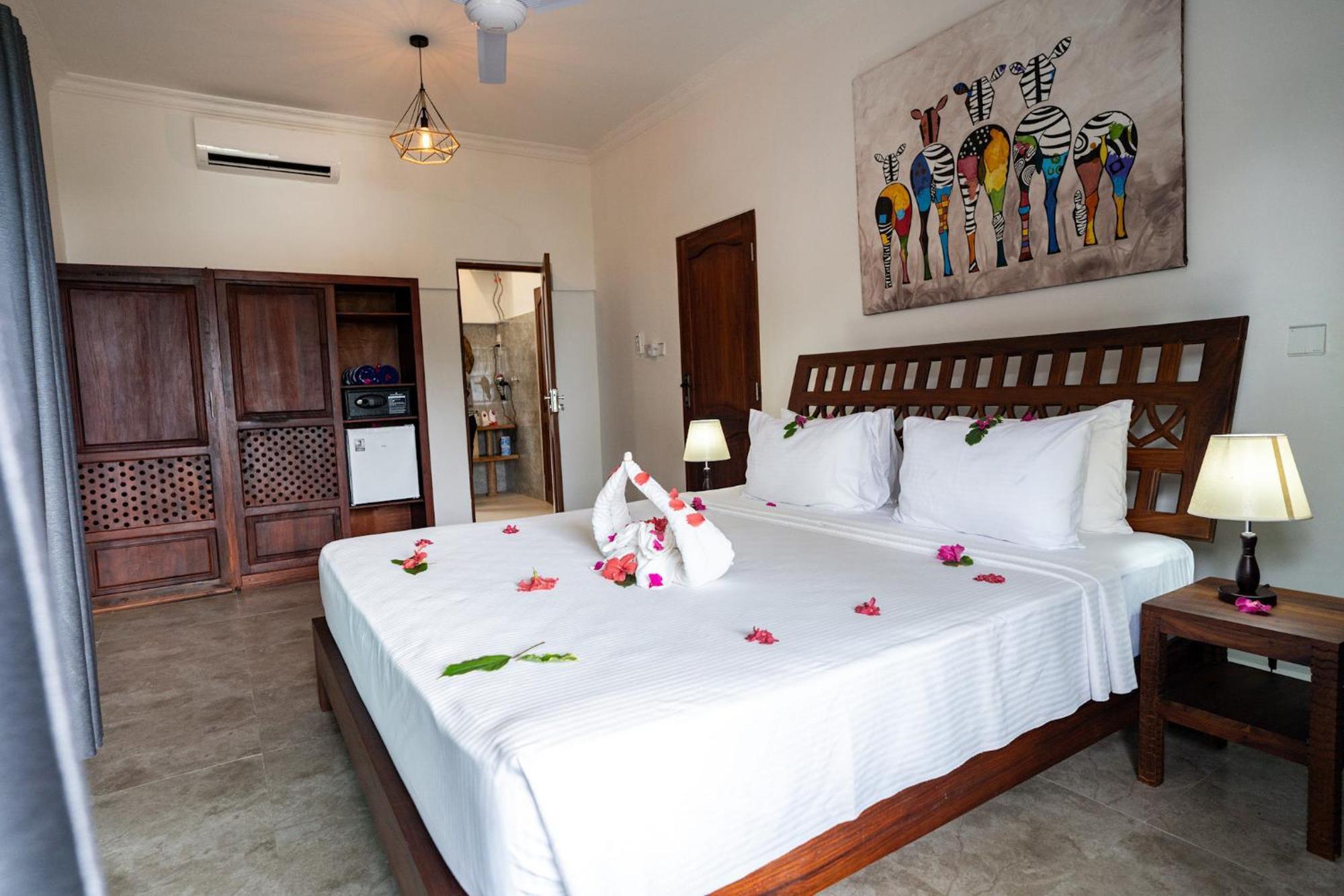 Manolo Beach Resort Уроа Стая снимка