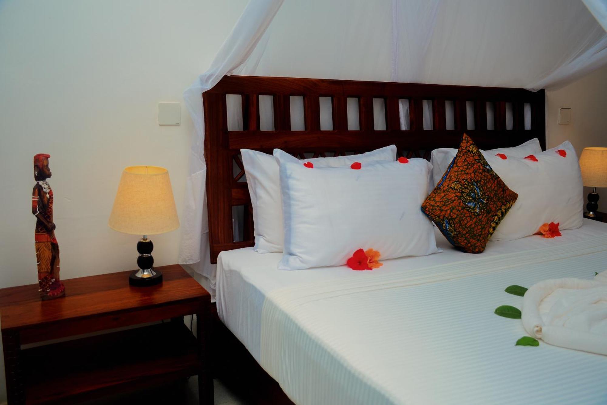 Manolo Beach Resort Уроа Екстериор снимка