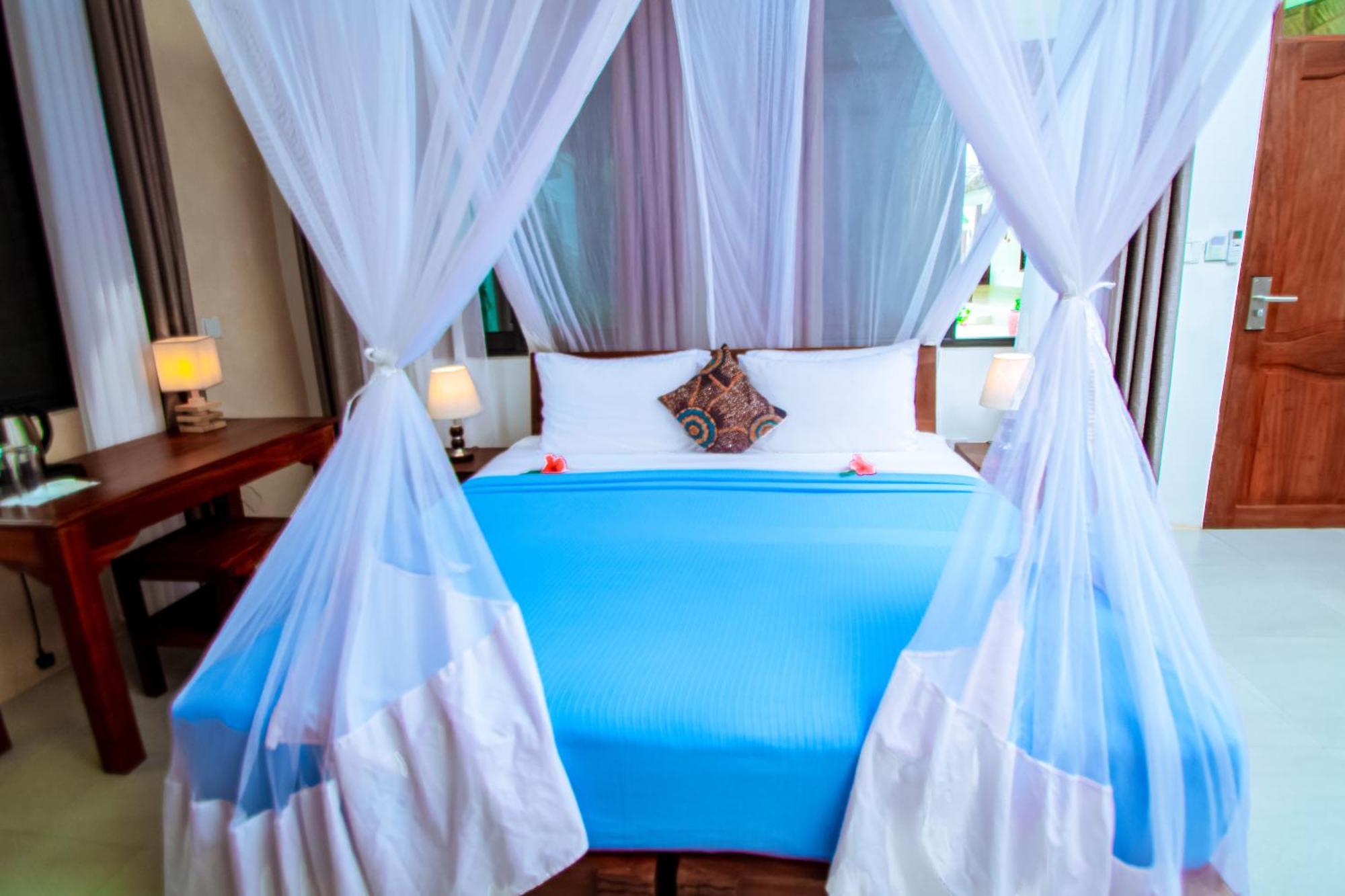 Manolo Beach Resort Уроа Екстериор снимка