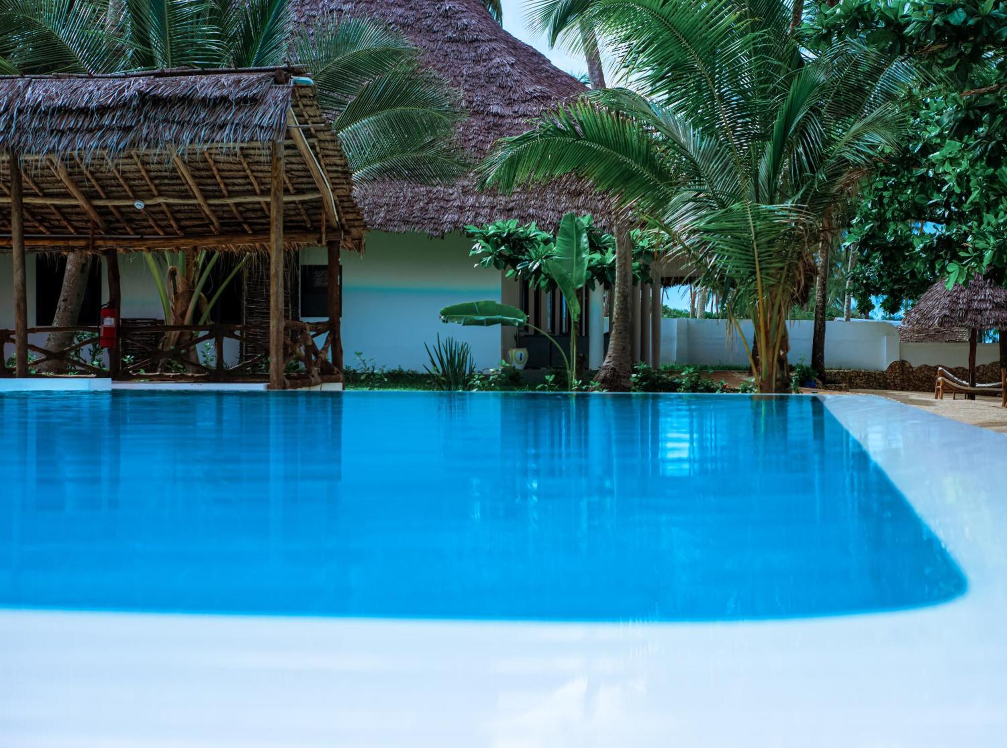 Manolo Beach Resort Уроа Екстериор снимка